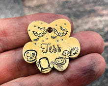 Load image into Gallery viewer, hand-stamped paw dog tag with Halloween dog tag