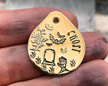 Load image into Gallery viewer, brass teardrop pet id tag with Halloween design and 2 phone numbers