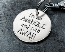 Load image into Gallery viewer, Funny dog tag, hand stamped with 'I'm an asshole and ran away'