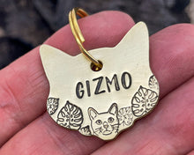 Load image into Gallery viewer, Cat head pet id tag, hand stamped with cute cat and leaves