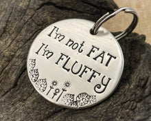 Load image into Gallery viewer, Funny dog tag, hand stamped with 'I'm not fat..I'm fluffy'