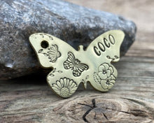Load image into Gallery viewer, Daisy dog id tag, butterfly shaped pet tag, hand stamped with flowers