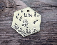 Load image into Gallery viewer, Hexagon dog tag, hand stamped with fairy design, flowers and feathers