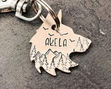 Load image into Gallery viewer, Wolf head dog tag, hand stamped metal dog tag with mountains & trees
