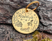 Load image into Gallery viewer, Christmas dog tag, hand stamped with Santa cabin and reindeer