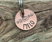 Load image into Gallery viewer, Halloween cat name tag, hand stamped spooky pumpkin and leaves
