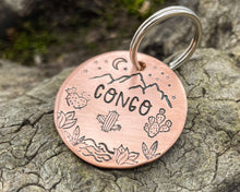 Load image into Gallery viewer, Mountain dog tag, hand-stamped with river, cactus and stars