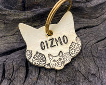 Load image into Gallery viewer, Cat head pet id tag, hand stamped with cute cat and leaves