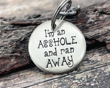 Load image into Gallery viewer, Funny dog tag, hand stamped with 'I'm an asshole and ran away'