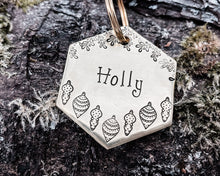 Load image into Gallery viewer, Christmas hexagon dog tag, hand stamped with holly and Christmas baubles