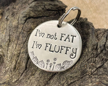 Load image into Gallery viewer, Funny dog tag, hand stamped with 'I'm not fat..I'm fluffy'