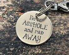 Load image into Gallery viewer, Funny dog tag, hand stamped with 'I'm an asshole and ran away'