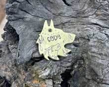 Load image into Gallery viewer, Wolf head dog tag, handstamped with wolf & trees