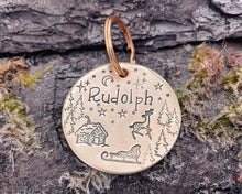 Load image into Gallery viewer, Christmas dog tag, hand stamped with Santa cabin and reindeer