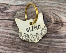 Load image into Gallery viewer, Cat head pet id tag, hand stamped with cute cat and leaves