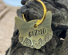 Load image into Gallery viewer, Cat head pet id tag, hand stamped with cute cat and leaves