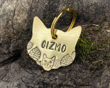Load image into Gallery viewer, Cat head pet id tag, hand stamped with cute cat and leaves