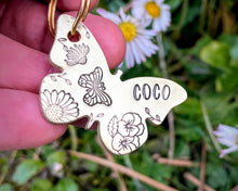 Load image into Gallery viewer, Daisy dog id tag, butterfly shaped pet tag, hand stamped with flowers