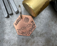 Load image into Gallery viewer, Hexagon dog tag, hand stamped with nautical design, compass & lighthouse