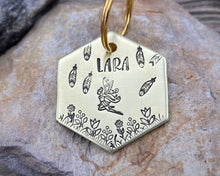 Load image into Gallery viewer, Hexagon dog tag, hand stamped with fairy design, flowers and feathers