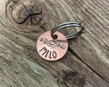 Load image into Gallery viewer, Halloween cat name tag, hand stamped spooky pumpkin and leaves