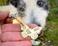 Load image into Gallery viewer, Daisy dog id tag, butterfly shaped pet tag, hand stamped with flowers