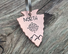 Load image into Gallery viewer, Arrow head dog tag with compass & mountains