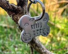 Load image into Gallery viewer, Bone dog id tag, handstamped with flowers and sheep
