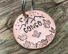 Load image into Gallery viewer, Mountain dog tag, hand-stamped with river, cactus and stars