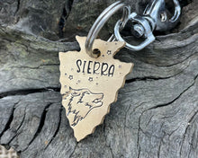 Load image into Gallery viewer, Arrow head dog id tag with wolfhead design