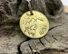 Load image into Gallery viewer, Dog id tag, hand stamped with wolf head, mountains & star design