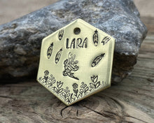 Load image into Gallery viewer, Hexagon dog tag, hand stamped with fairy design, flowers and feathers