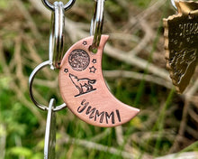 Load image into Gallery viewer, Moon dog tag, hand-stamped with howling wolf & moon