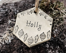 Load image into Gallery viewer, Christmas hexagon dog tag, hand stamped with holly and Christmas baubles