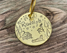 Load image into Gallery viewer, Christmas dog tag, hand stamped with Santa cabin and reindeer