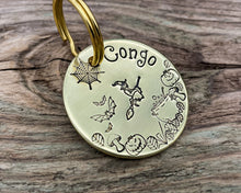 Load image into Gallery viewer, Halloween dog tag with cobwebs and witch