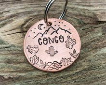 Load image into Gallery viewer, Mountain dog tag, hand-stamped with river, cactus and stars