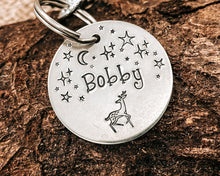 Load image into Gallery viewer, Winter dog id tag, hand stamped with reindeer and stars