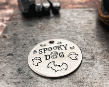 Load image into Gallery viewer, hand-stamped dog tag with spooky dog design