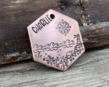 Load image into Gallery viewer, Hexagon dog tag, hand stamped with nautical design, compass & lighthouse