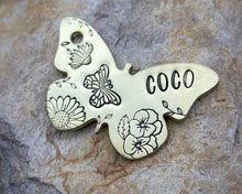 Load image into Gallery viewer, Daisy dog id tag, butterfly shaped pet tag, hand stamped with flowers