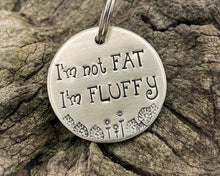 Load image into Gallery viewer, Funny dog tag, hand stamped with 'I'm not fat..I'm fluffy'