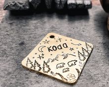 Load image into Gallery viewer, hand stamped metal dog tag with bear family, mountains and stars