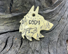Load image into Gallery viewer, Wolf head dog tag, handstamped with wolf & trees