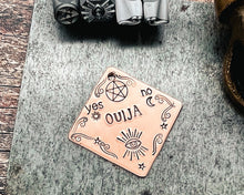 Load image into Gallery viewer, Ouija spooky dog tag, hand stamped square dog id tag with ouija design, 2 phone numbers or address on the back