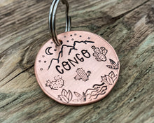 Load image into Gallery viewer, Mountain dog tag, hand-stamped with river, cactus and stars