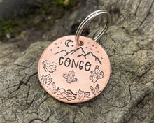 Load image into Gallery viewer, Mountain dog tag, hand-stamped with river, cactus and stars