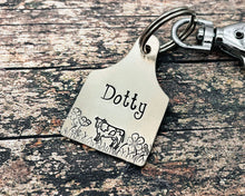 Load image into Gallery viewer, Custom dog id tag, cow ear tag, hand stamped pet id tag with cute cow and flower design