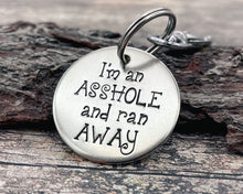 Load image into Gallery viewer, Funny dog tag, hand stamped with 'I'm an asshole and ran away'