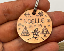 Load image into Gallery viewer, Christmas dog id tag, hand stamped with snowman and cabin
